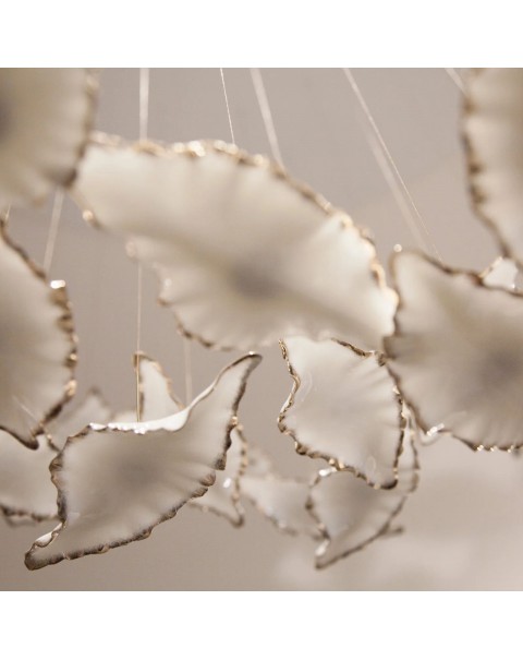 Chandelier with golden branches and jade leaves