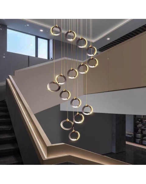 Staircase chandelier light luxury circle net red light simple post-modern villa loft duplex Nordic living room chandelier jewelry