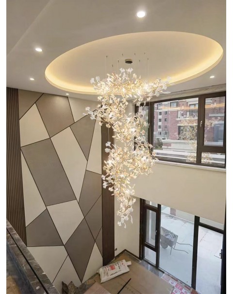 Duplex large chandelier loft staircase light light light luxury villa overhead leaping living room lobby ginkgo leaf light